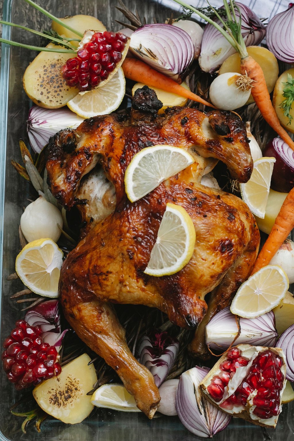 Close up of sheet pan lemon herb chicken and vegetables