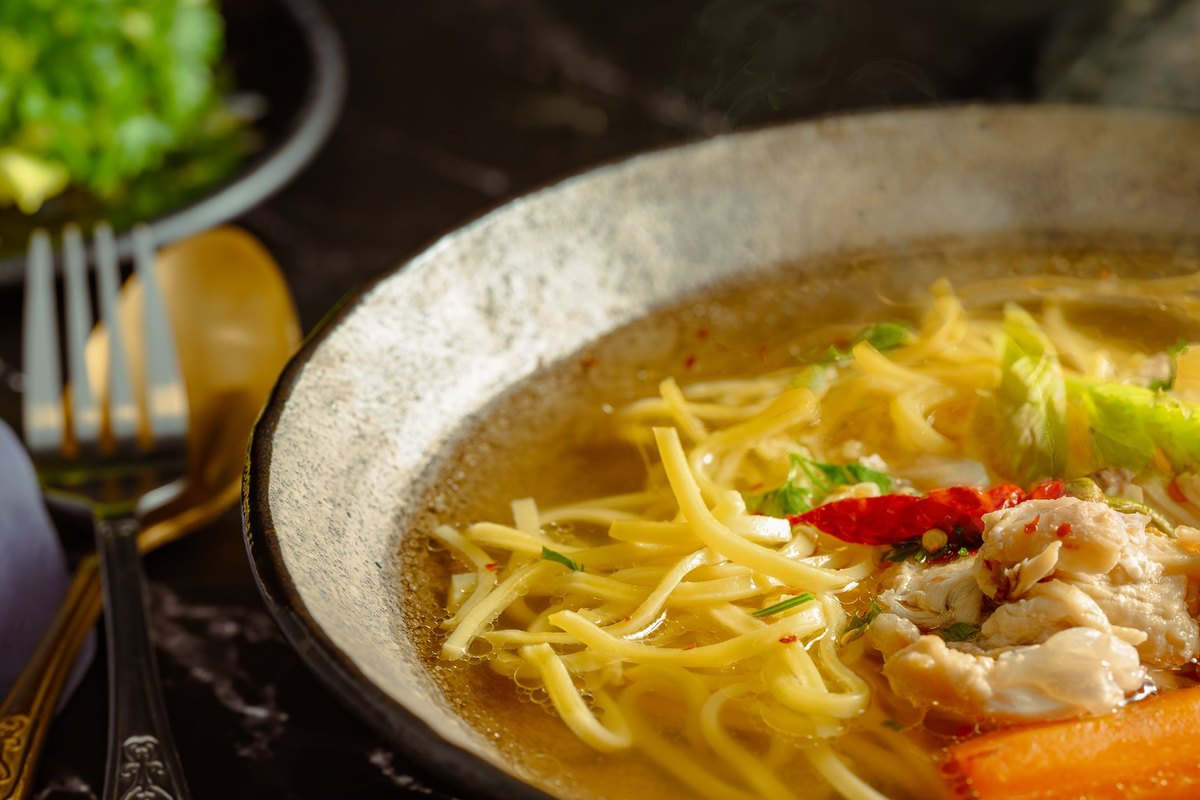 A serving of homemade chicken noodle soup