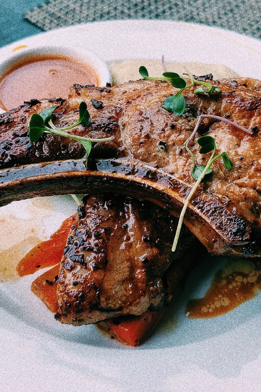 Close up of sheet pan pork chops with acorn squash
