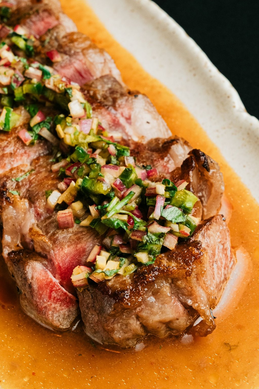 Close up of sheet pan pork tenderloin with apples and onions